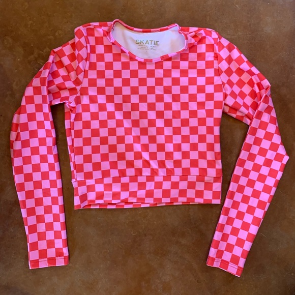 Skatie Other - Skatie pink and red checker cropped rash guard good to EUC worn maybe 5 times